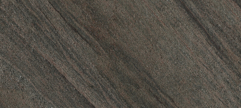 Wall background of volcanic andesite basalt stone texture - architecture background. natural stone facade, wall tiles texture
