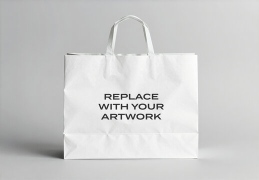 Paper shopping bag mockup with replaceable artwork and placeholder text on a neutral studio background for branding, packaging, Template, retail design presentation