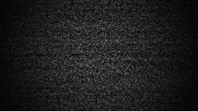 Static tv noise, bad tv signal monochrome TV static noise interference on a TV screen caused by satellite signal loss. No signal, flickering, old analog vintage concept. 4k, digital video.