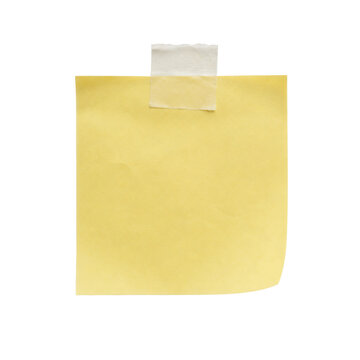 Empty yellow sticky note with a curled corner and masking tape attached to a white background