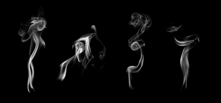 White smoke or fog isolated on black background for design elements, abstract texture, vapor effect, and atmospheric background for creative or cinematic use
