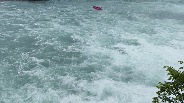 Waterfall rheinfall water stream fall, Rhine river cascades in Switzerland. Power of Nature.