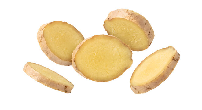 Levitating fresh sliced ginger root pieces on transparent background