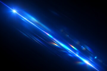 Fototapeta premium Abstract blue light streak with lens flare effect isolated on a deep black background for digital design