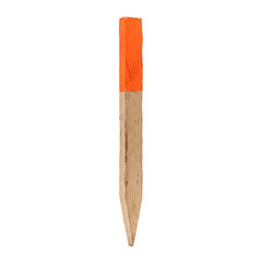 Wooden stake with bright orange painted top for marking and surveying purposes