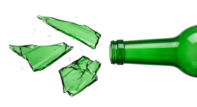 Green glass bottle shattered into sharp fragments isolated on transparent background for creative advertising and graphic design projects.