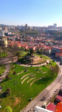 People relaxing in the jardim das virtudes public park in porto, portugal