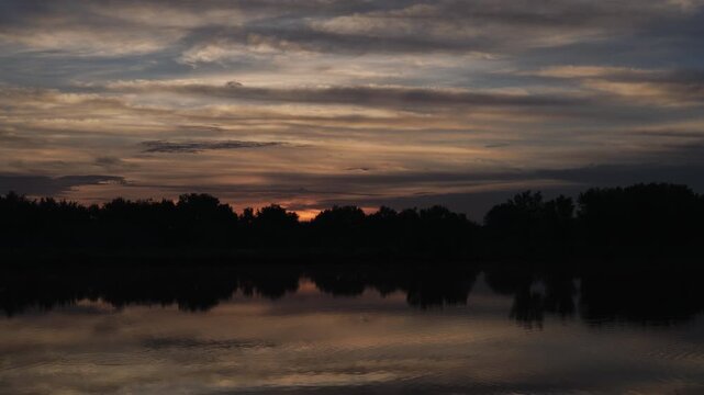 Sunrise Reflections on Colorado Pond Timelapse