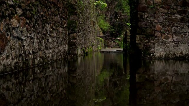 14 August, 2026, Vasai, Maharashtra, India &mdash; Monsoon water inside the weathered stone ruins of Vasai Fort.