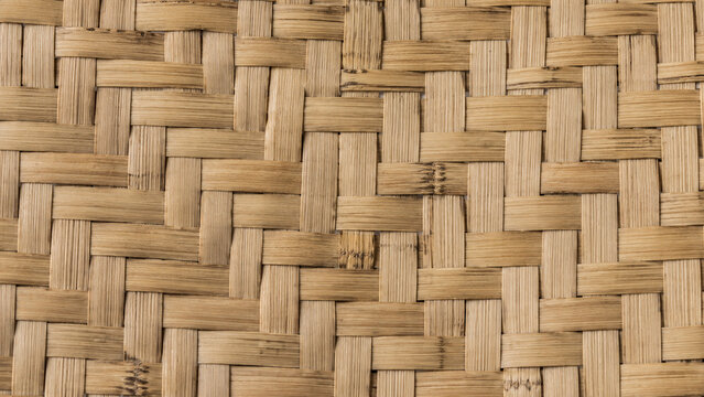 Natural woven bamboo texture background with crisscross pattern