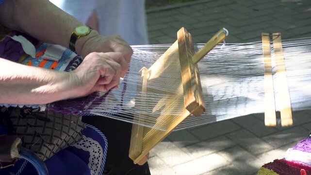 Traditional Weaving Loom Demonstration at Handicraft Fair