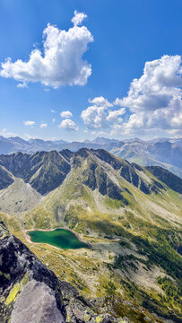 Alpine mountain lake beneath clouds near Bad Gastein, Austria