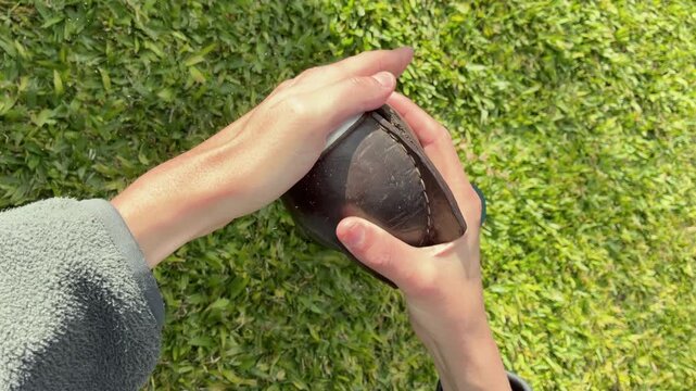 Hands Preparing Traditional South American Infusion, Yerba Mate, Typical social drink from Argentina, Uruguay, Paraguay and Brazil. 
