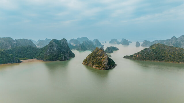Misty karst islands in Ha Long Bay, Vietnam