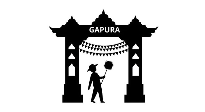 Silhouette of person standing under a traditional indonesian gapura gate