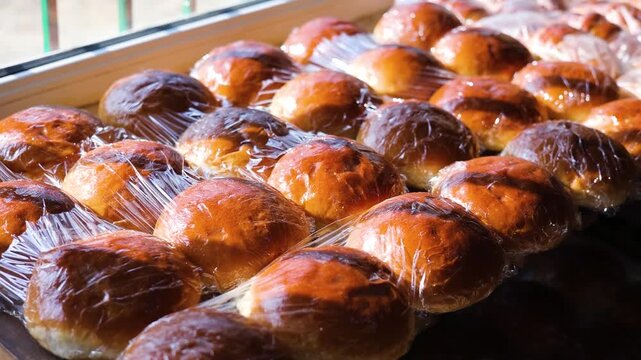 Bakery Working Process, Industrial Bread and Pastry Production in Modern Bakery Factory, Dough Mixing, Kneading, Baking and Packaging on Automated Production Line, Food Manufacturing Facility.