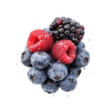 Fresh mixed berries including raspberries blueberries and blackberries isolated on transparent background