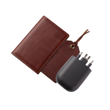 Brown leather travel adapter case with plug and charging accessories isolated on transparent background