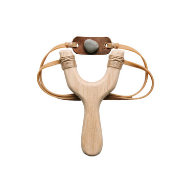Classic wooden slingshot with leather pouch and stone projectile.
