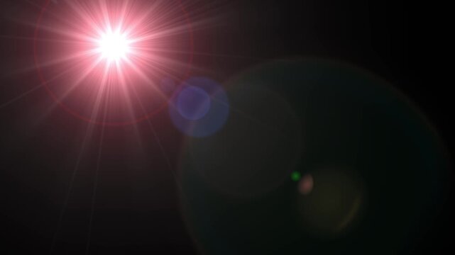 35mm prime Dramatic lens flare and starburst effect on black background - stock video