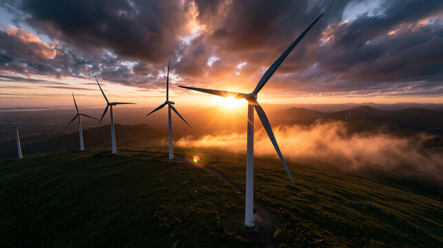 Wind Turbines on Mountain Generating Renewable Energy at Sunset
