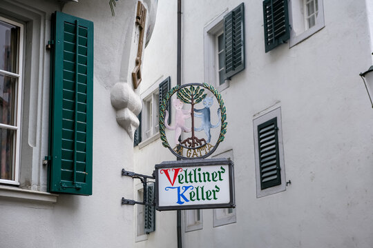 Zurich, Switzerland - March 15, 2026. A low-angle exterior shot captures the historic facade of the Veltliner Keller restaurant in Zurich, Switzerland. The building features an ornate bay window struc