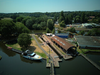 Aerial drone view of Stourport-on-Severn town centre, Worcestershire, England. Bird's eye perspective of the historic market town, streets, red brick buildings, and surrounding landscape. © Xander Multimedia