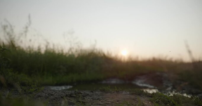 Caucasian man with long hair and Ukrainian traditional folk attire run away being chased . 4K 10-bit