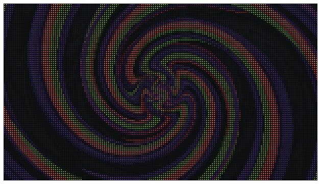 Spiral vortex halftone pattern with rainbow hues.