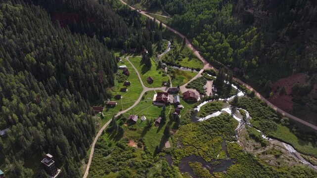 Aerial of historic mining town Dunton in Dolores County Colorado in summer with restored cabins at luxury mountain resort
