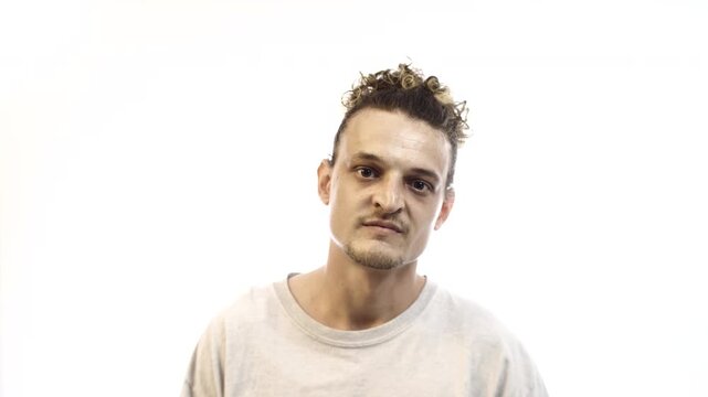 Man Showing Contempt and Disdainful Expression on White Background