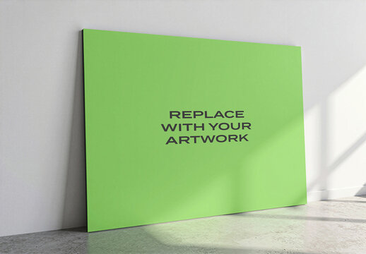 Large canvas mockup standing upright on a wooden floor against white wall in modern interior with natural light, realistic art presentation, blank surface for graphic design or print display
