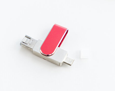 Red and Silver Dual Connector USB Flash Drive on White Background