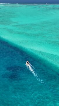 Parasail In San Andres Providencia Y Santa Catalina Colombia. Thrilling Adventure With Speedboat Paragliding In Turquoise Ocean. Tropical Skyline.