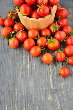 Fresh tomatoes vegetables, Fresh Harvest Ripe red farm organic cherry tomato on dark old background	