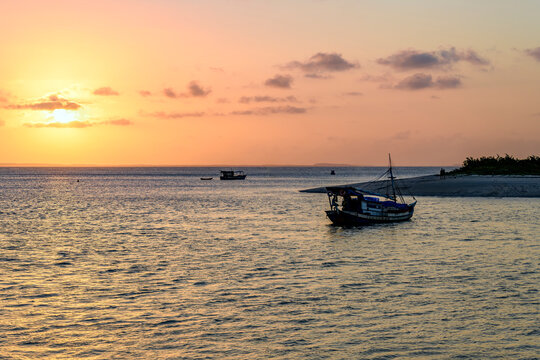 Trawlers at Ponta de Areia Beach during sunset in the city of S&atilde;o Lu&iacute;s, Maranh&atilde;o