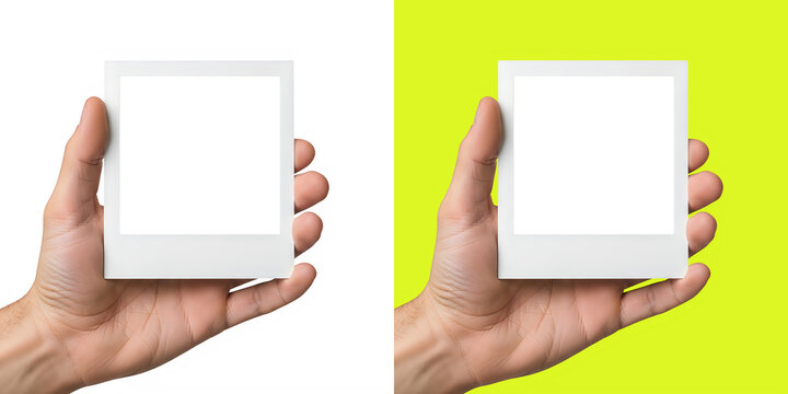 Hand holding blank instant photo frame