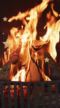 Animation of stars over flames in fireplace