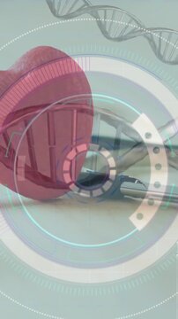 Animation of dna strands and scope scanning over stethoscope and heart
