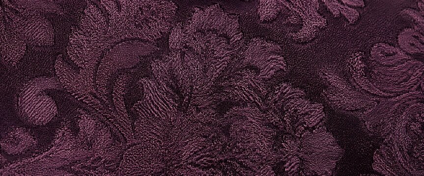 Damask fabric texture with deep purple floral pattern in soft light ideal for luxury interiors
