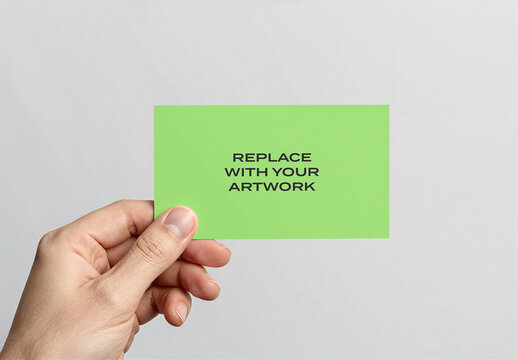 Business card mockup held in hand against a plain background, realistic stationery presentation with placeholder text, visual communication template for branding, identity design