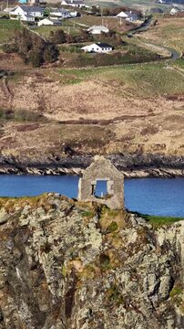 Aerial view of the remaining wall of the old coastguard station in Teelin, County Donegal, Ireland