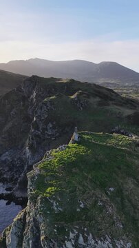 Aerial view of the remaining wall of the old coastguard station in Teelin, County Donegal, Ireland