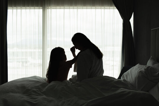 Portrait of mother taking care of child feeling tired stressed at home	

