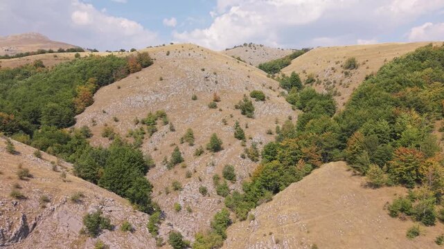 Aerial View of Rolling Hills and Forested Slopes on Visocica Mountain, Bosnia and Herzegovina