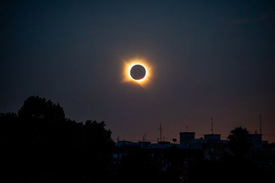 Total solar eclipse totality, Valencia, Spain, above a silhouette foreground