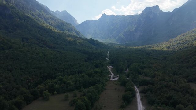 Aerial Flyover of Forest and Dirt Road Below Wildfire Smoke Haze on Prenj Mountain, Bosnia and Herzegovina