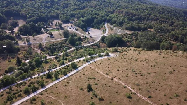 Aerial View of Winding Road Leading to Javorov Do Resort and Parking Lot Above Bjelasnica Mountain, Bosnia and Herzegovina