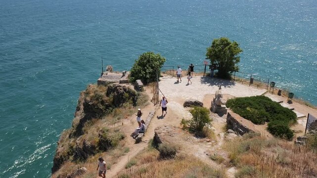 Tourists enjoying the scenic view from cape kaliakra over the black sea
