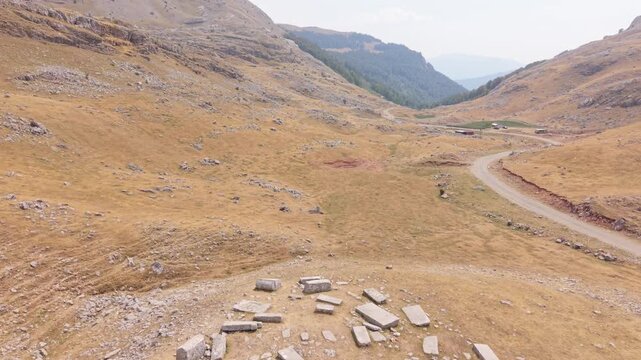 Aerial Flyover of Medieval Stecci Tombstones Necropolis on Mountain Slopes in Visocica, Bosnia and Herzegovina
